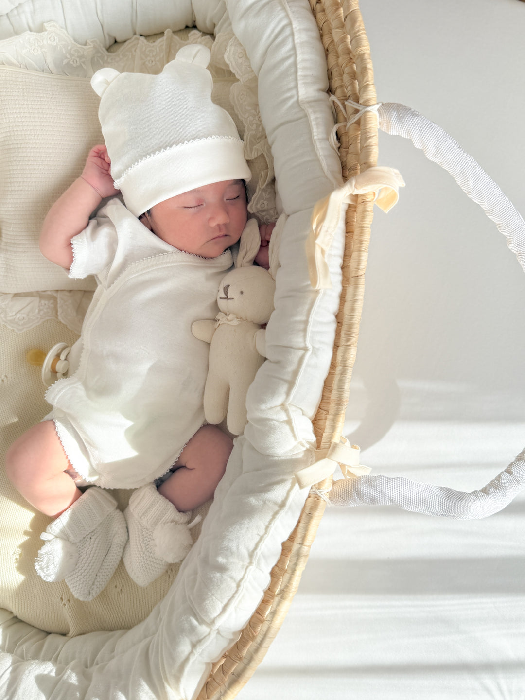 bébé / knit pompom shoes (新生児から)